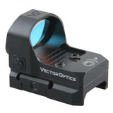 Vector Optics Frenzy 1x20x28 rødpunktsigte monteret på side af airsoftvåben.